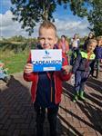 Jeugd Het Schietertje tijdens Herfst weer volop aan de waterkant